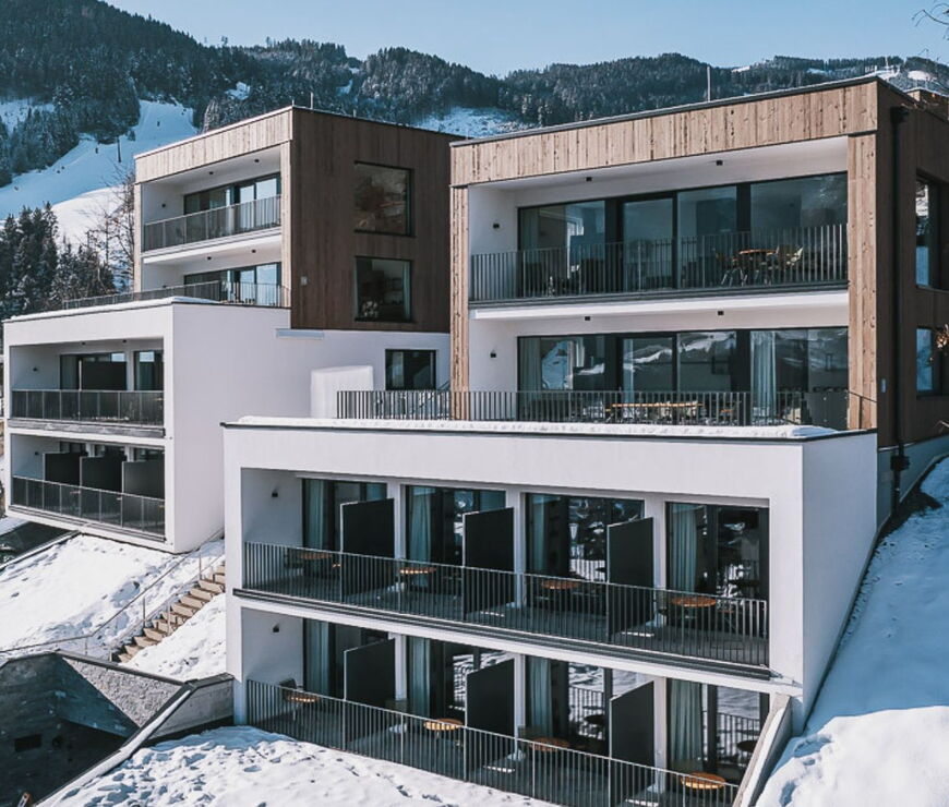 Hotel Nikolaus by AvenidA in Zell am See in winter